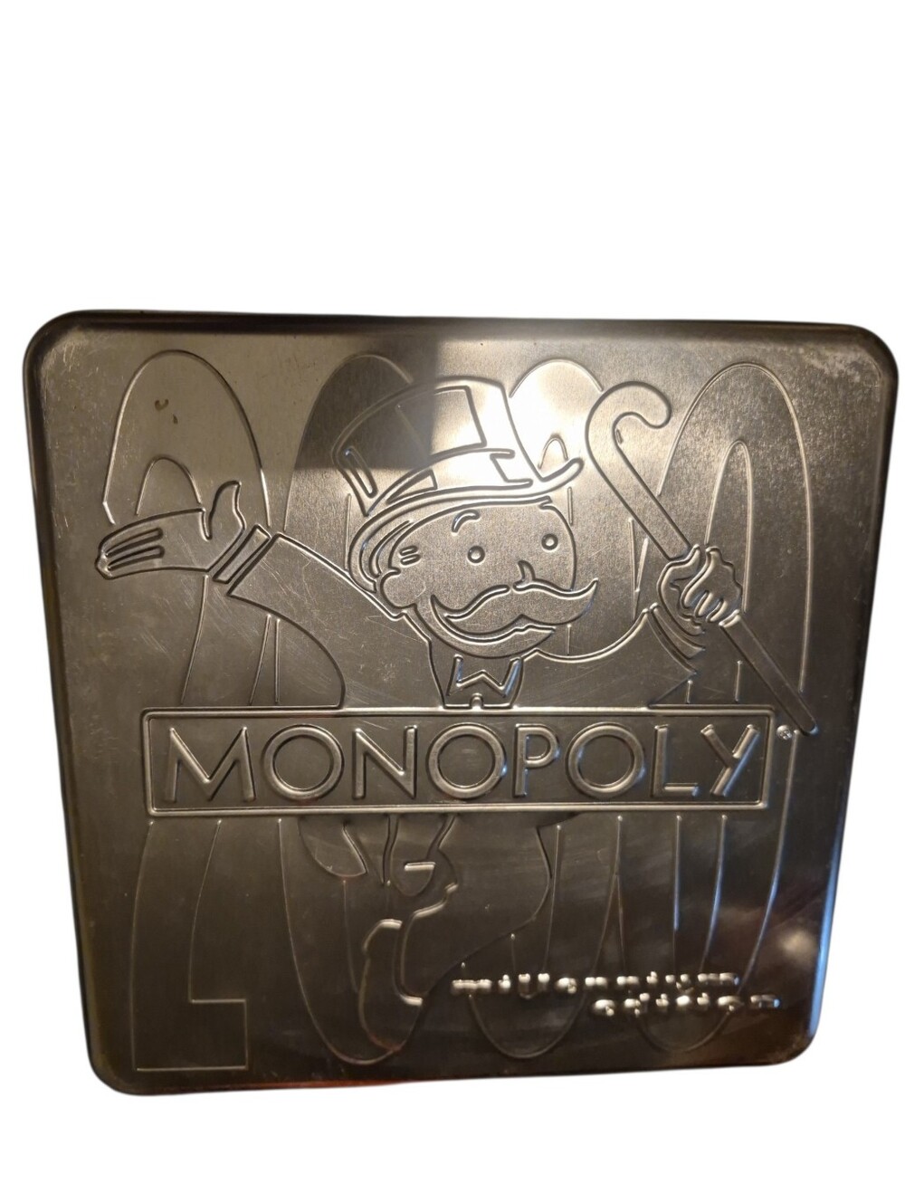 Hasbro Monopoly 2000 Embossed Silver Collector Tin Game